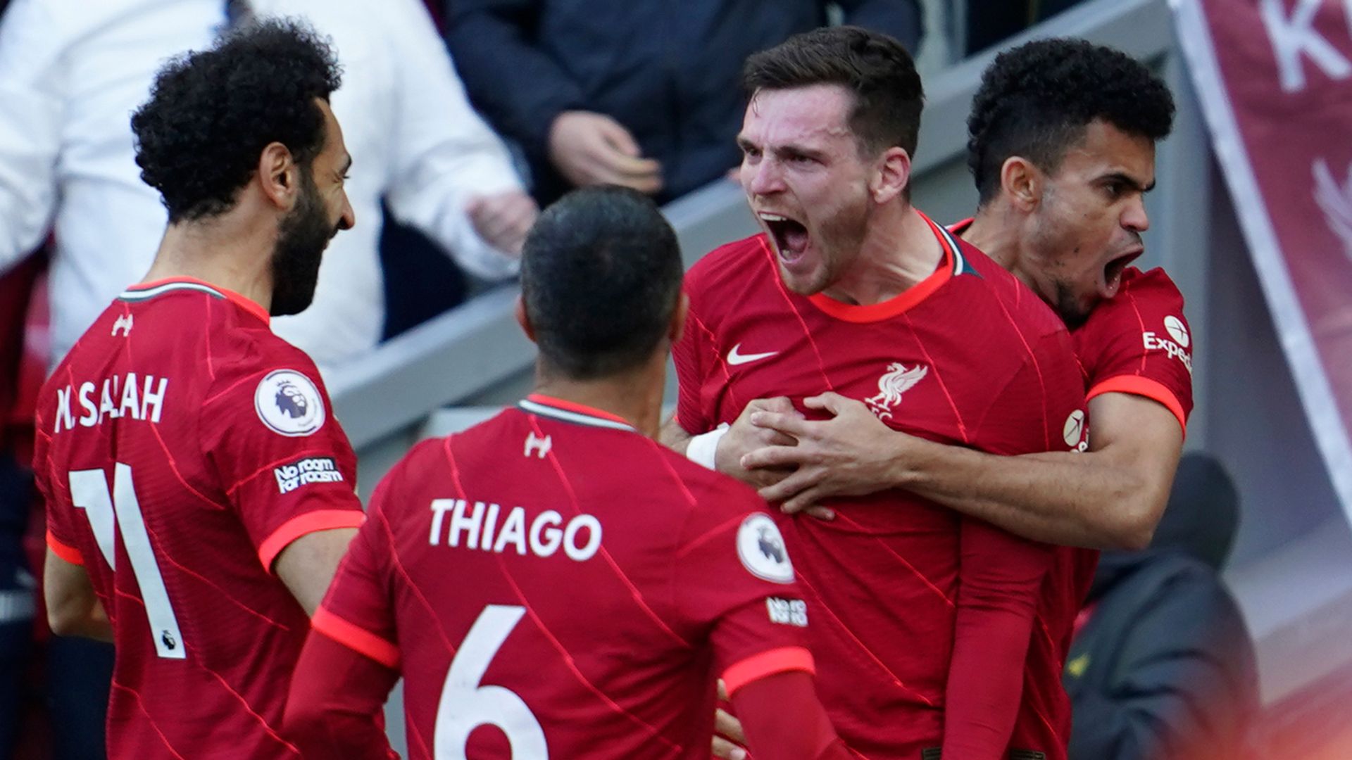 Liverpool overcome Everton in tense derby