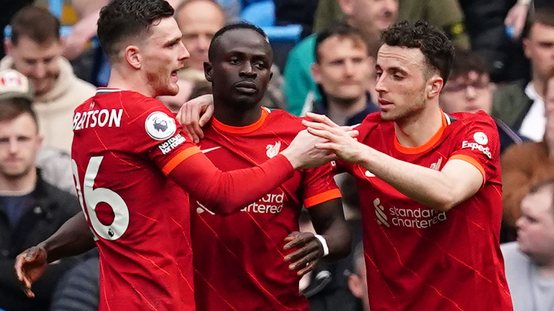 Liverpool peg back Man City twice to keep epic title race in balance