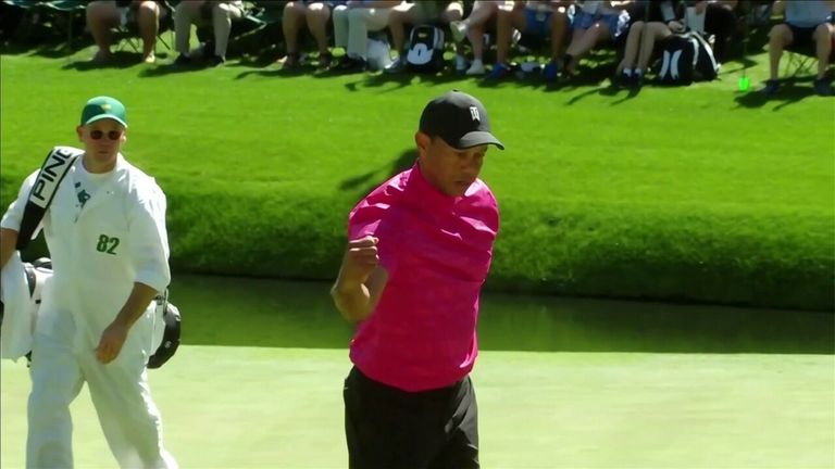 Watch Tiger Woods hole a long-range birdie putt to get back to one under par on the 16th!