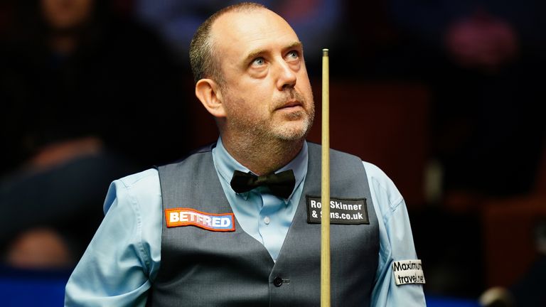 Mark Williams surged into the quarter-finals of the World Snooker Championship with a session to spare