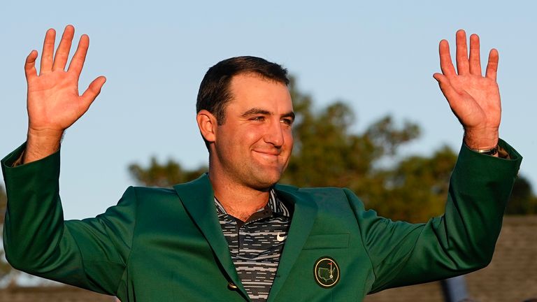 Scottie Scheffler celebrates after putting on the Green Jacket after winning the 86th Masters