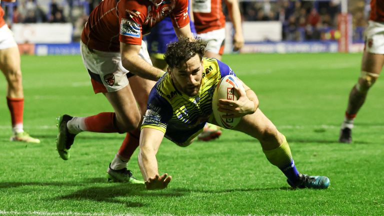 King scores one of his 52 tries for the Wolves