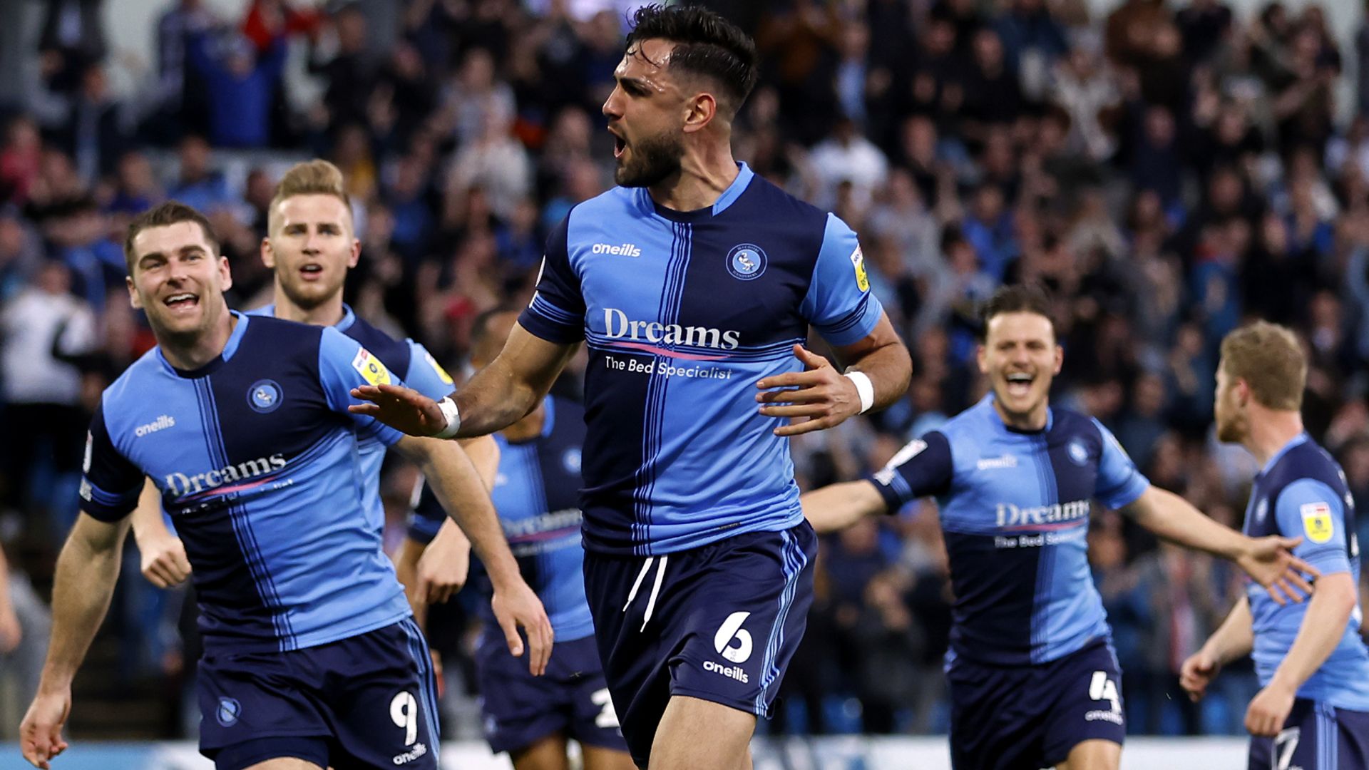 Wycombe take control of tie as they beat 10-man MK
