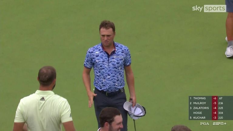 Justin Thomas holes his birdie putt at the 9th hole and shoots 67 in Round 2 of the PGA Championship to take him one shot ahead of Rory McIlroy. 