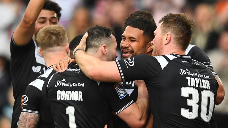Hull FC scored six tries to see off Wigan and keep pressure on the Super League top four