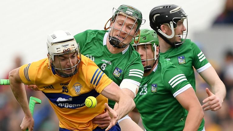 Ryan Taylor is tracked by three Limerick players