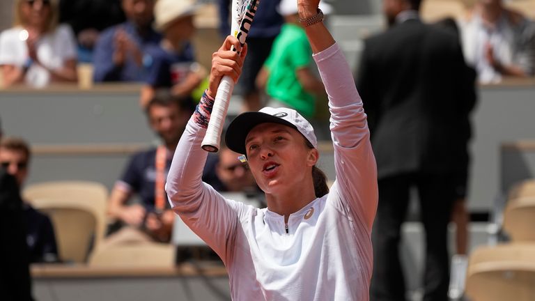 Poland's Iga Swiatek reached the fourth round of the French Open and extended her winning streak to 31 matches on Saturday