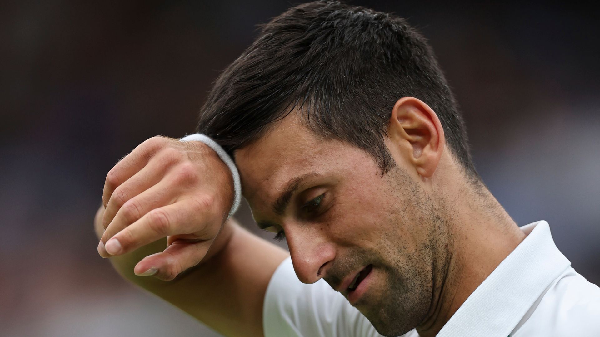 Djokovic's Wimbledon defence up and running with four-set win