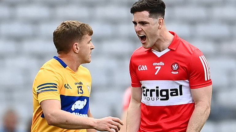 Padraig McGrogan of Derry celebrates his side's first goal towards Padraic Collins of Clare