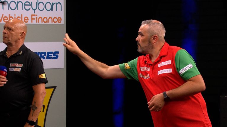 Watch Portugal's Vitor Jeronimo's unorthodox throw as he 'waves goodbye' to the dart