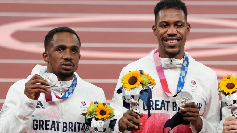 CJ Ujah (L) and Zharnel Hughes with their silver medals at the Tokyo Olympics, which they later lost after Ujah's positive test