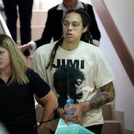 WNBA star and two-time Olympic gold medalist Brittney Griner is escorted to a courtroom for a hearing, in Khimki just outside Moscow