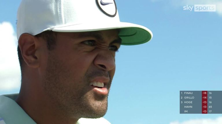 Tony Finau enjoys a huge stroke of luck on the par-three 17th as he makes par after narrowly avoiding the water 