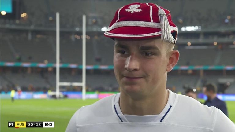 Jack van Poortvliet gives his reaction after scoring a try on his Test debut for England in the defeat to Australia.