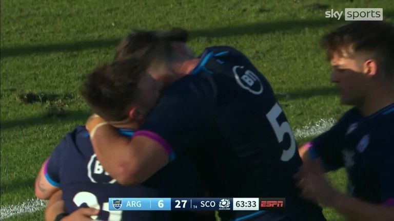 Sam Johnson breaks through the line to score Scotland's fourth and final try against Argentina