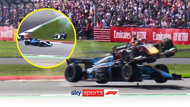 The halo saves Roy Nissany as Dennis Hauger's car is launched over the top of the Williams test driver during the F2 Feature race at Silverstone.