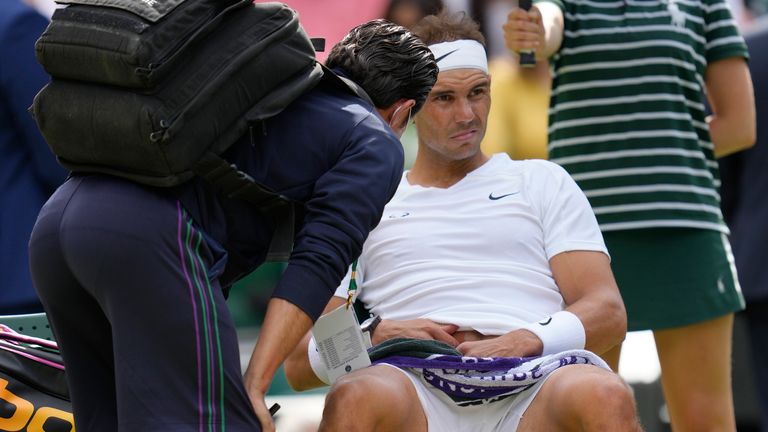 Nadal took a medical timeout to take painkillers with his team members motioning from the stands for him to quit