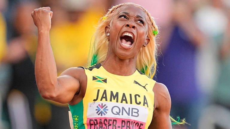 Shelly-Ann Fraser-Pryce celebrates after her World Championships triumph