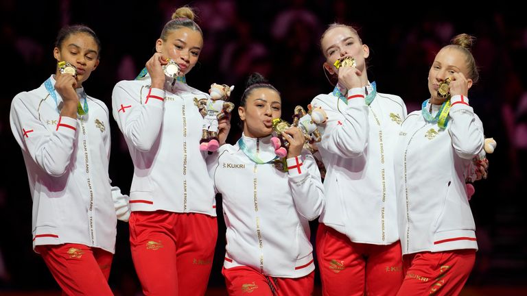 Team England celebrate with their gold medals for the women's team finals at the Commonwealth Games