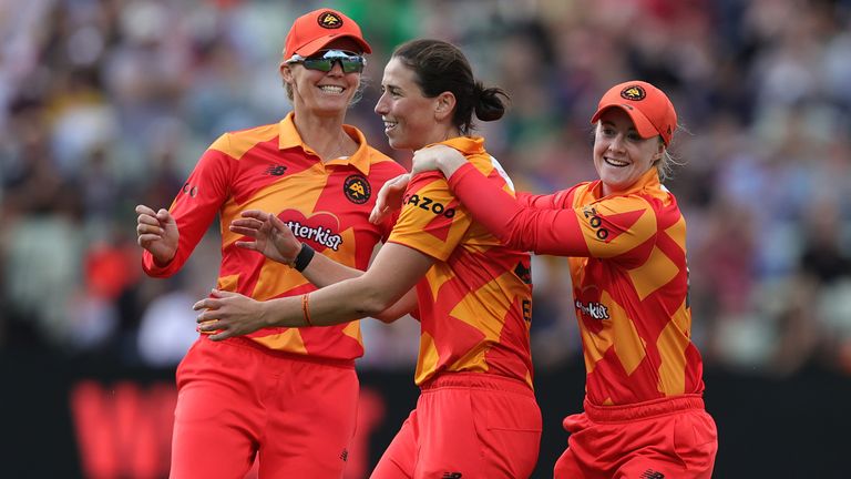 Georgia Elwiss of Birmingham Phoenix is mobbed by team mates after taking the wicket of Hollie Armitage during The Hundred clash with Northern Superchargers
