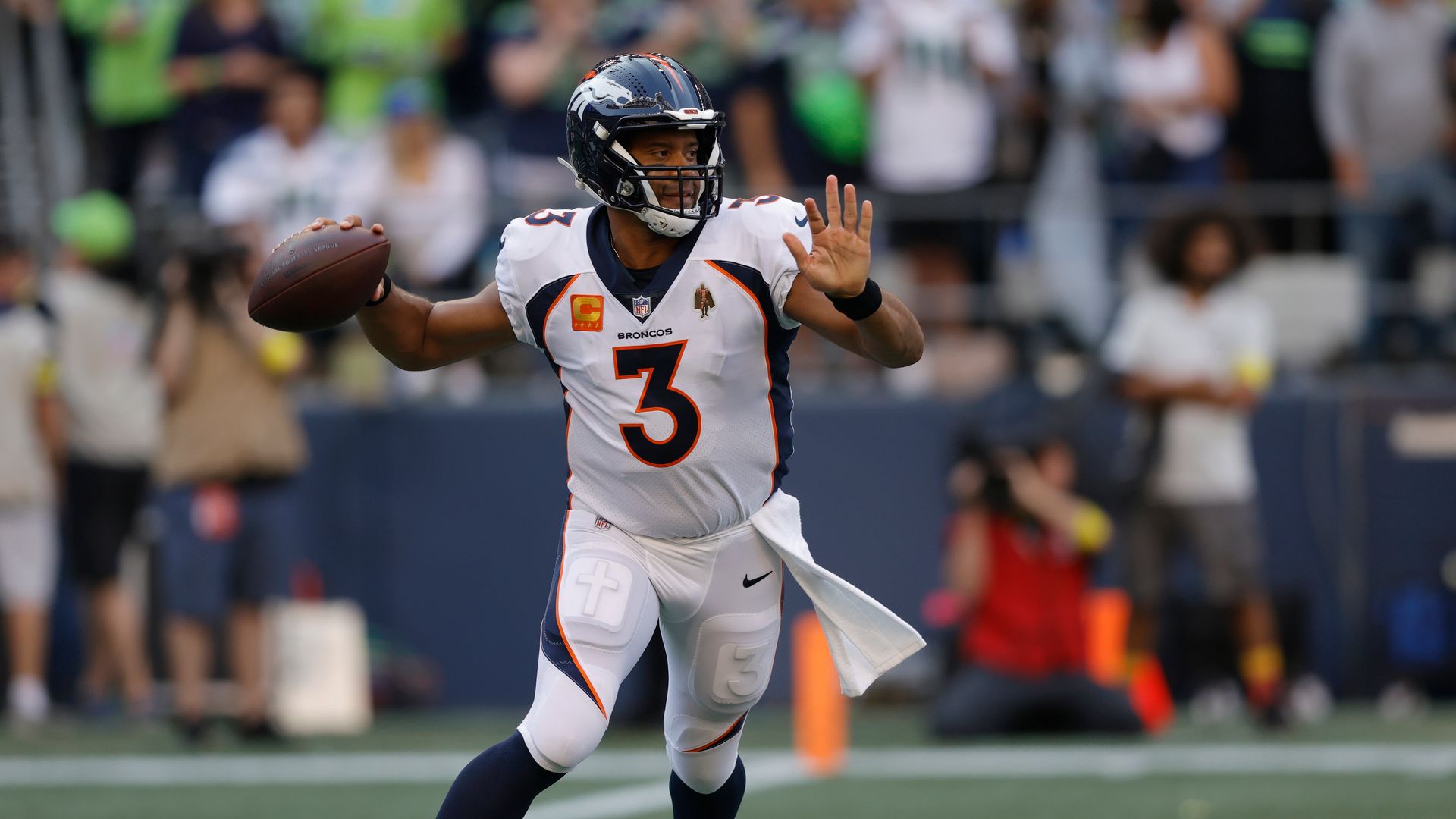 Wilson throws first TD as Broncos QB in Seattle