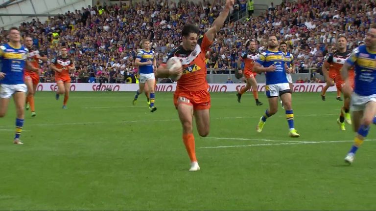 Castleford Tigers' Jake Mamo races in from halfway to finish and score the first try of the game