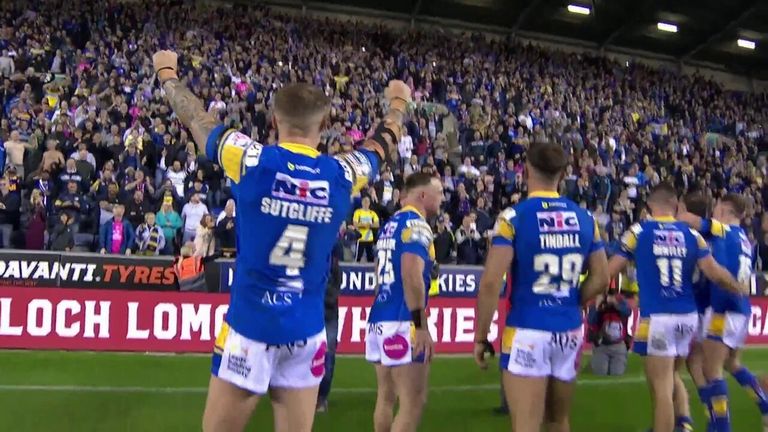 The Leeds Rhinos players celebrated with their fans after reaching the Super League Grand Final