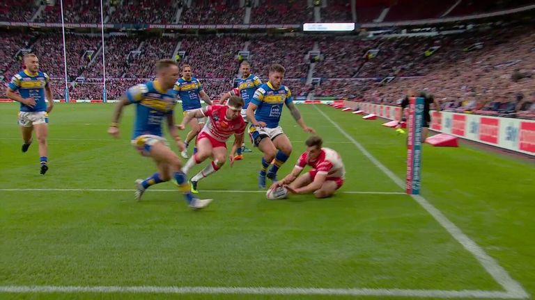 Jon Bennison goes over to extend St Helens' lead over the Leeds Rhinos in the Grand Final.