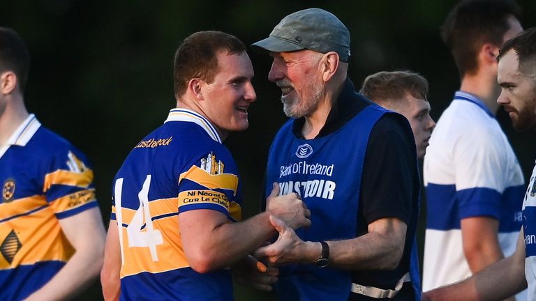 St Vincent's manager Brian Mullins shares a word with Castleknock's Ciarán Kilkenny after the teams' 2021 Dublin SFC meeting