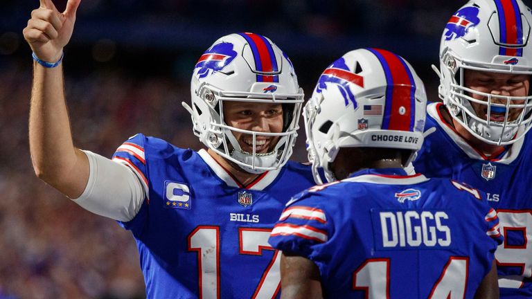 Buffalo Bills quarterback Josh Allen celebrates wide future Stefon Diggs after one of his three touchdown calls