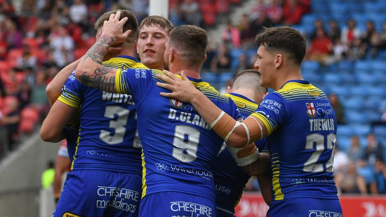 Warrington celebrate a try in their win over Salford