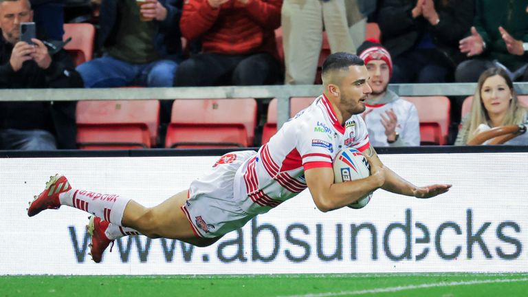 Caleb Aekins dives over for a try in Leigh's win over Batley