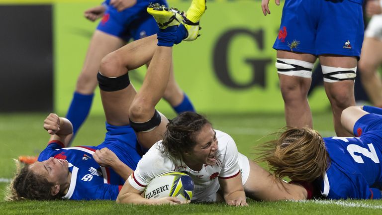 England's Emily Scarratt dives over to score a try against France