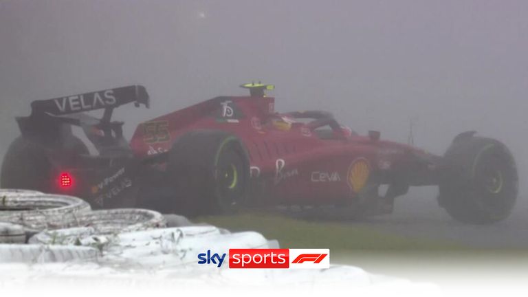 Carlos Sainz crashes out on the opening lap in heavy rain before red flags bring a halt to the Japanese GP