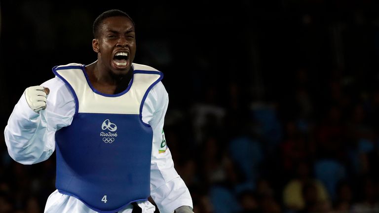 Great Britain's Lutalo Muhammad celebrates winning the men's Taekwondo 80-kg semifinal at the 2016 Olympics in Rio