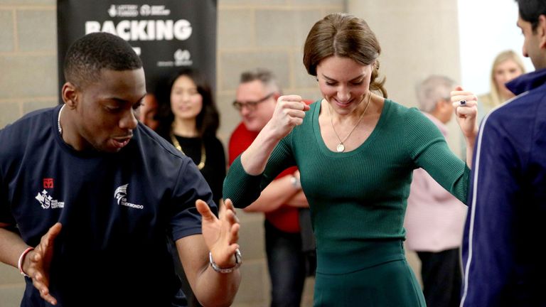 The Duchess of Cambridge is shown Taekwondo moves by Lutalo Muhammad at the London Stadium in 2020