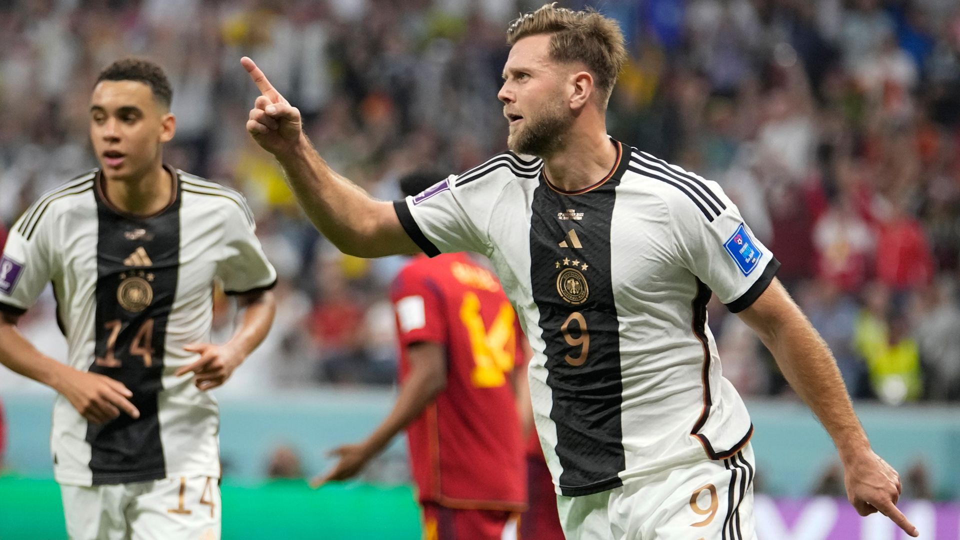Germany find late equaliser vs Spain to keep last-16 hopes alive