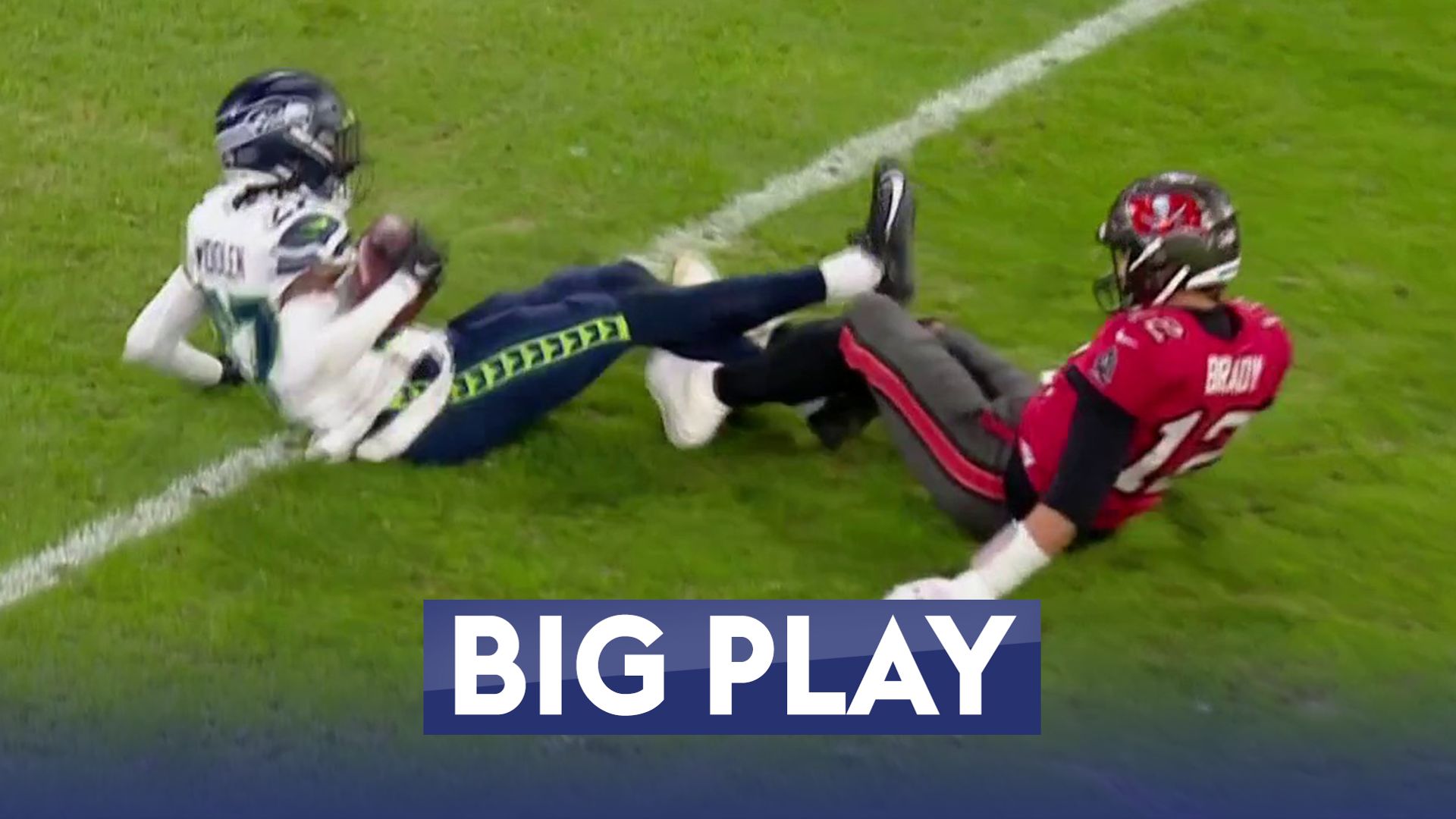 Brady slips, ball is picked and he is flagged for tripping!