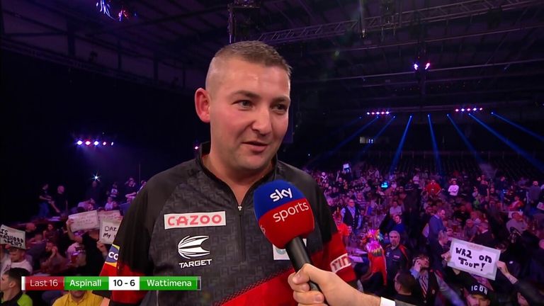 Nathan Aspinall reflected on his win over Jermaine Wattimena and reveals how letting people back into games frustrates his family at the Grand Slam of Darts.