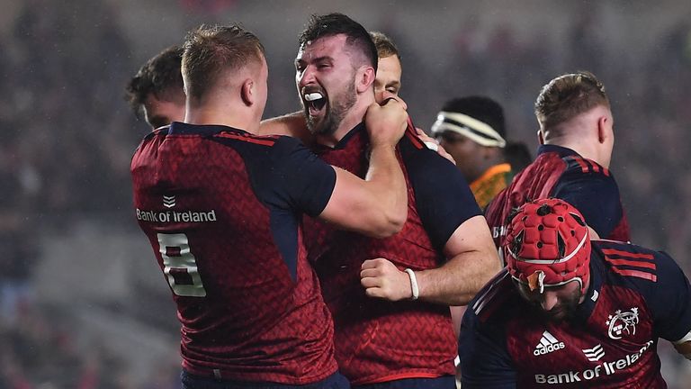 Diarmuid Barron celebrates scoring Munster's third try late in the first half