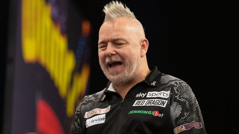 World Champion Peter Wright was sensationally dumped out of the Grand Slam of Darts on Tuesday night