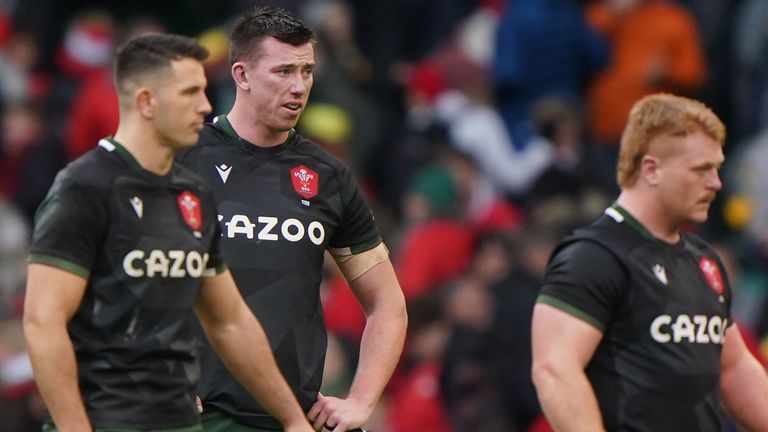 Wales players show their dejection after their defeat to Georgia