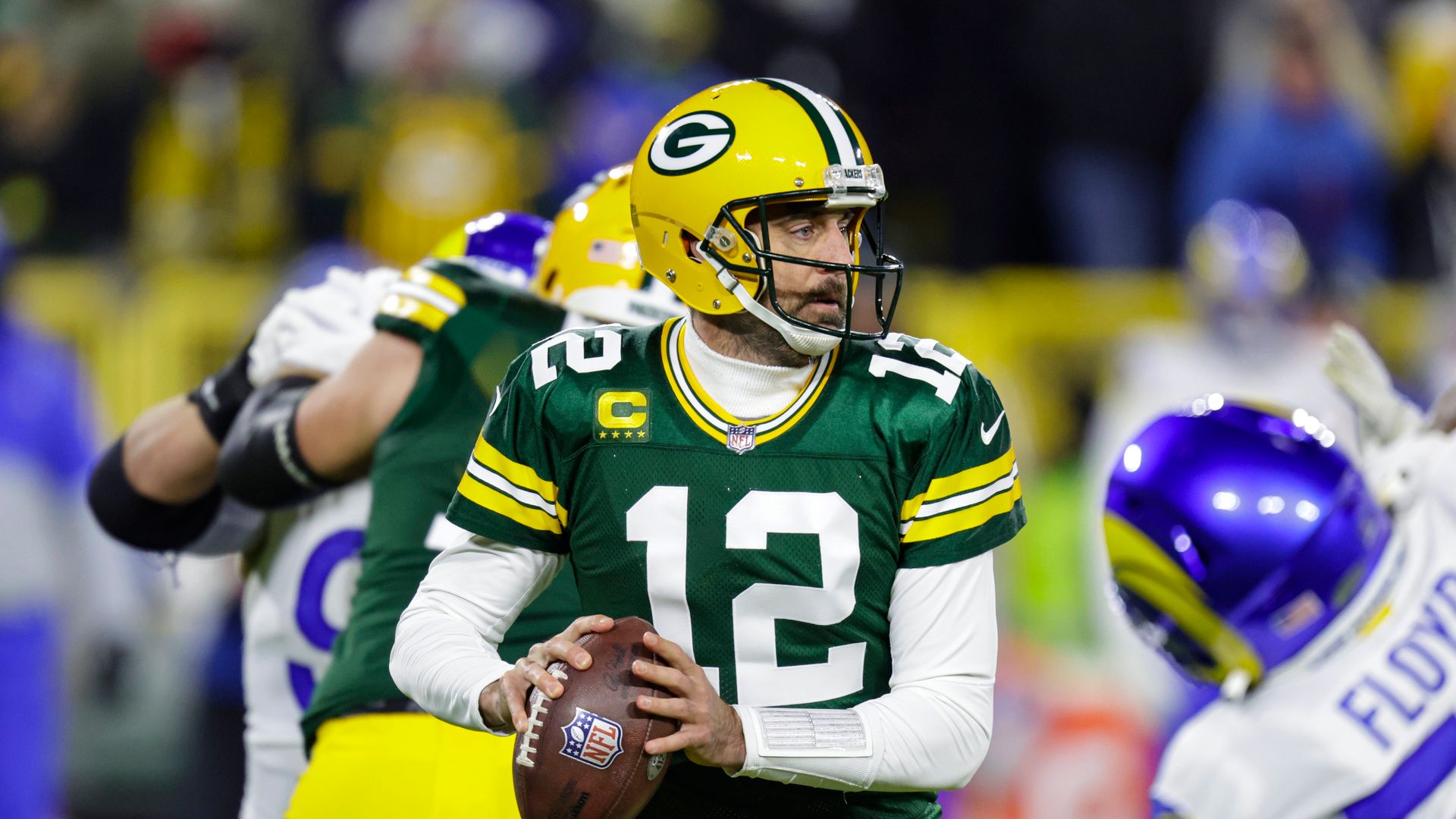 Rodgers' bizarre overthrow finds Rapp for the interception