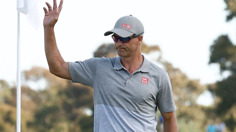 Adam Scott didn't make his first birdie until the 12th but had 31 on the back nine for a 67 to keep the lead.