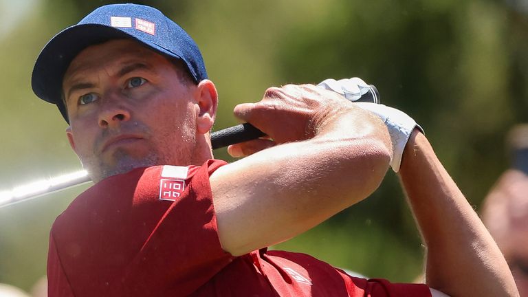 Adam Scott holds a share of the halfway lead in Melbourne