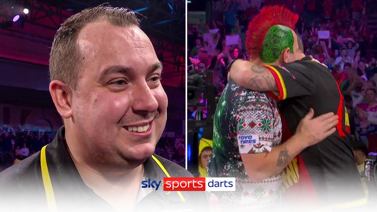 Kim Huybrechts se mantiene humilde mientras reacciona al noquear a Peter Wright para asegurar su lugar en los últimos dieciséis del Campeonato Mundial de Dardos. 