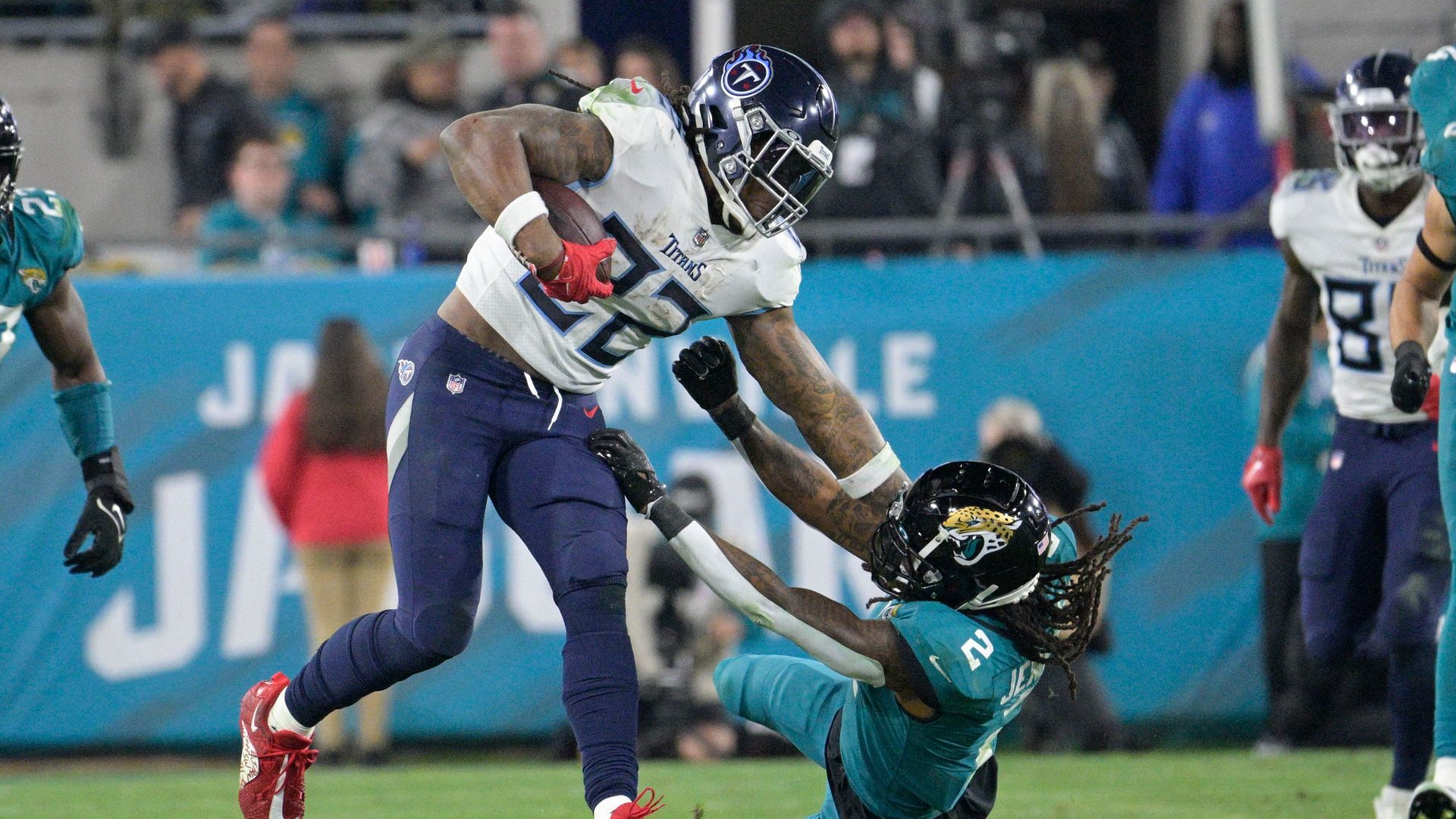 Henry throws Jags defender to ground with vicious stiff-arm!