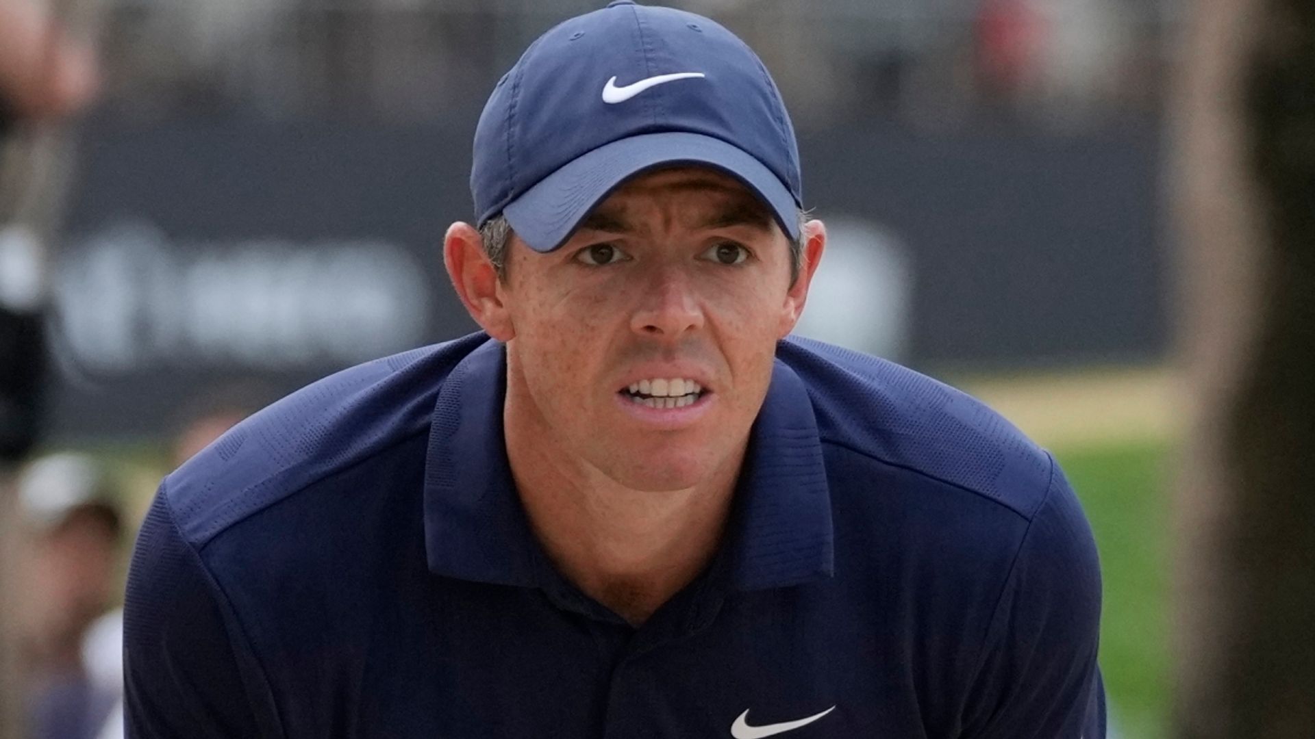 McIlroy stays in contention and avoids Reed pairing in Dubai