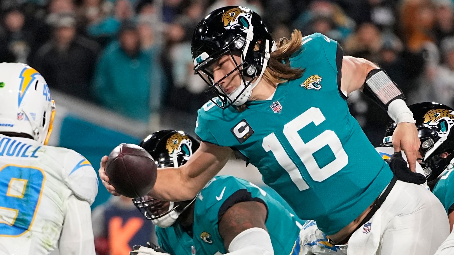 Lawrence overcomes four INTs as Jags come back to stun Chargers