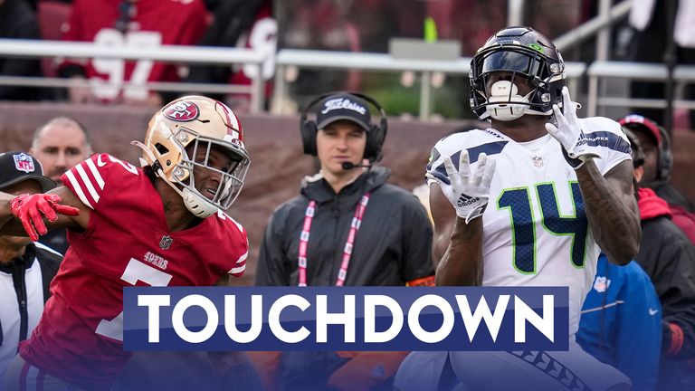 Seattle Seahawks quarterback Geno Smith throws a perfect 50-yard pass into DK Metcalf's hand for a great touch!